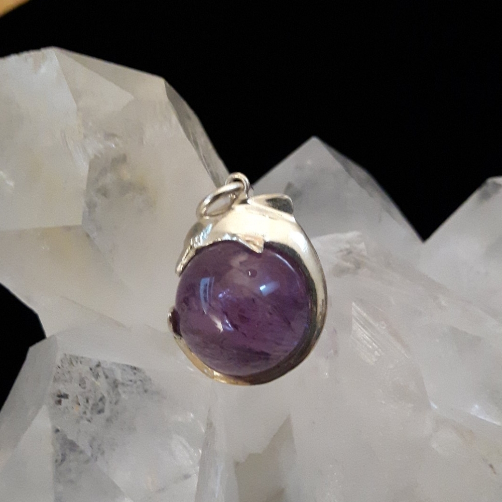 Sterling silver amethyst dolphin pendant